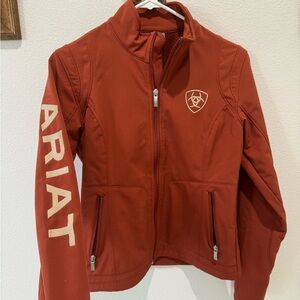 Ariat Women Softshell Jacket Orange and gold jacket from Ariat